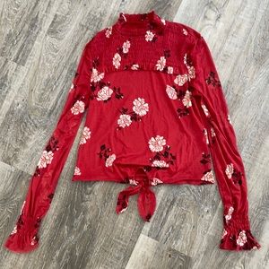 Red floral blouse with small turtleneck